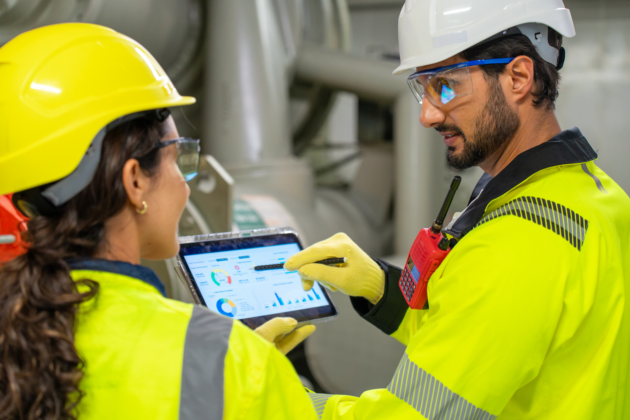 HVAC Specialist Planning and Installing Air Ducts, Check Valves, and Insulation at Facility.